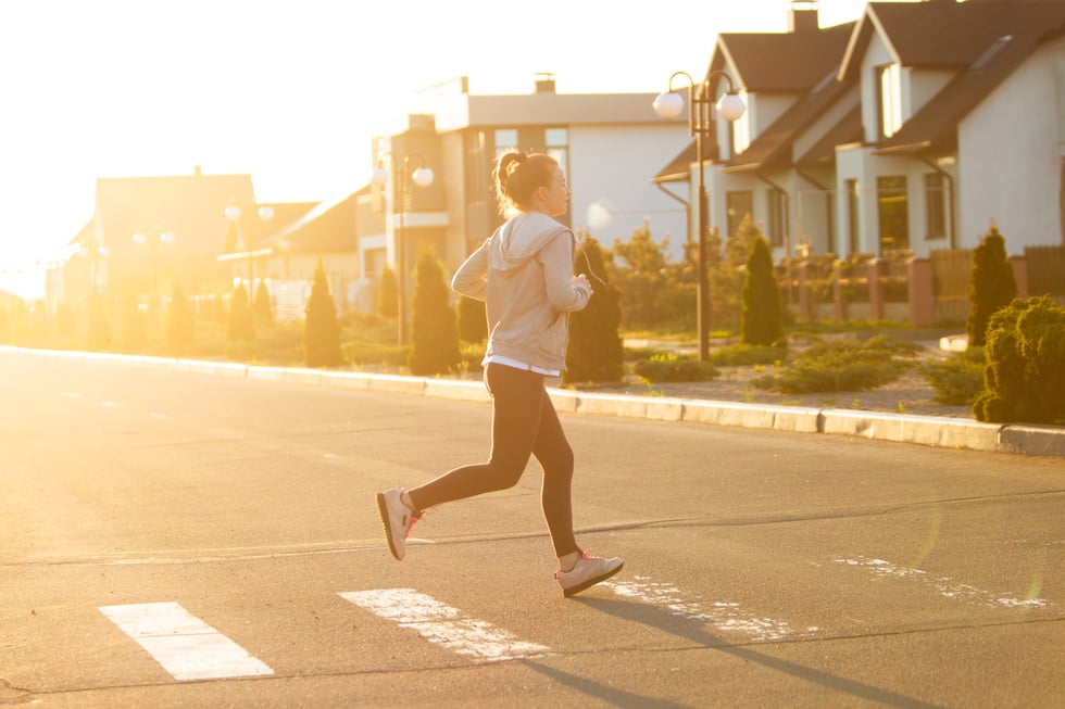 Young Woman Jogging Outdoors 